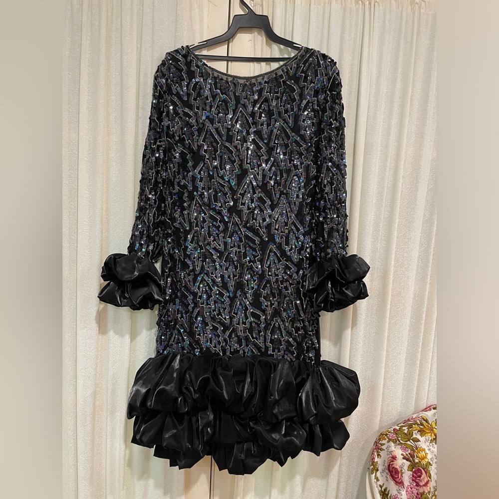 Formal dress, sequin embroidered, balck with taffeta trimmings. Coutured